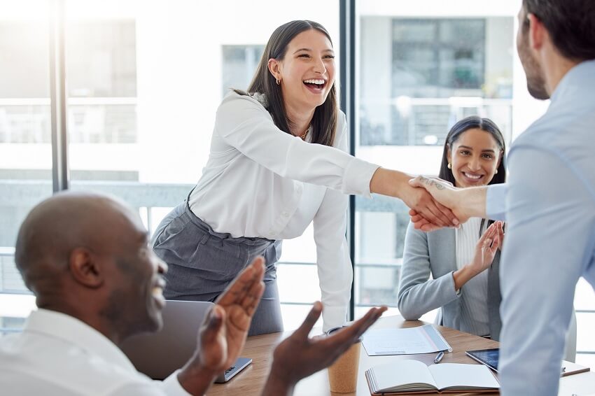 Business team shaking hands.